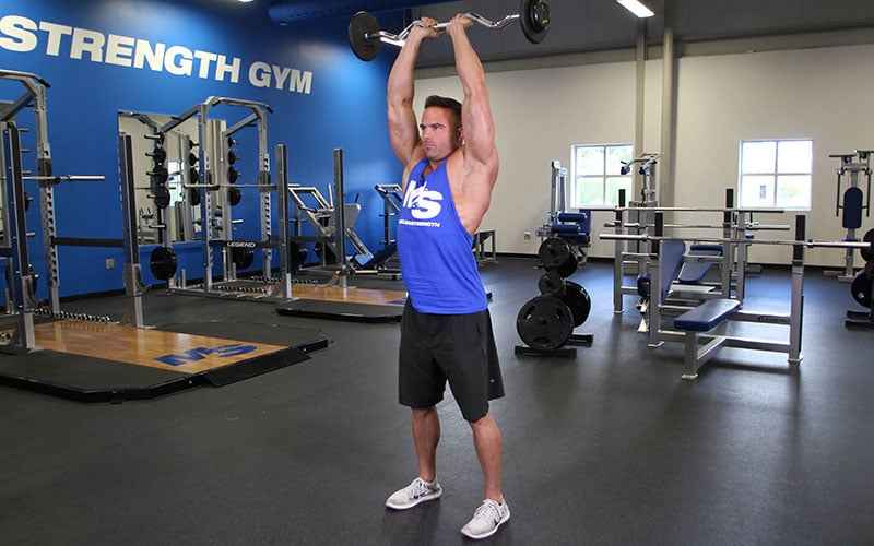 Hướng dẫn bài tập video: Duỗi bắp tay sau qua đầu với thanh EZ đứng